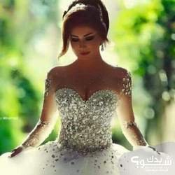 معرض الزهرة البيضاء لبدلات العرائس