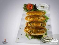 مطعم وكوفي شوب علوش 3alooosh